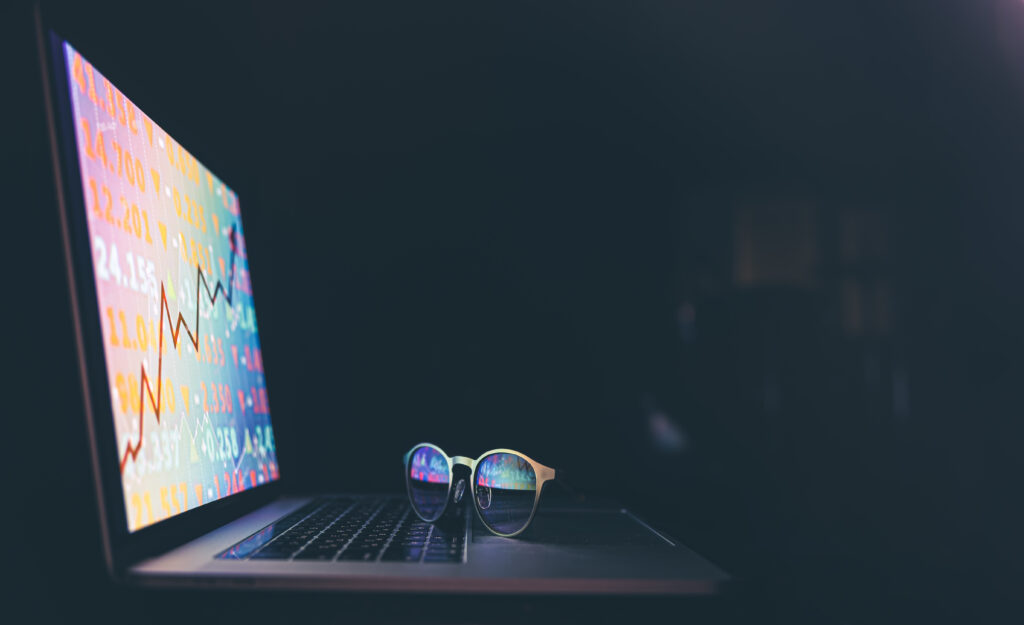 stock market graph financial data electronic board laptop screen